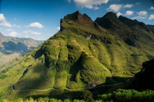 Wind, sunshine and clouds create a wild mountainous area